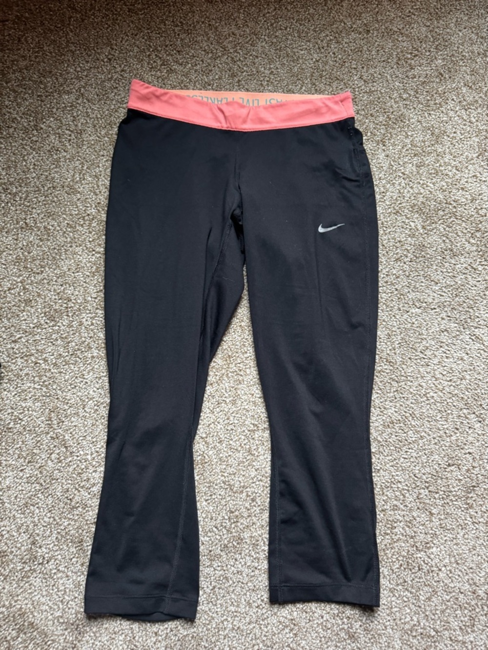 Nike women’s Black Capri Leggings with Coral Waistband